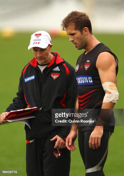 Mark McVeigh of the Bombers speaks to staff during the Essendon Bombers AFL training session at Windy Hill on April 13, 2010 in Melbourne, Australia.