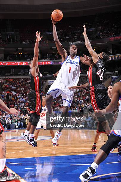 Samuel Dalembert of the Philadelphia 76ers shoots against Udonis Haslem of the Miami Heat during the game on April 12, 2010 at the Wachovia Center in...