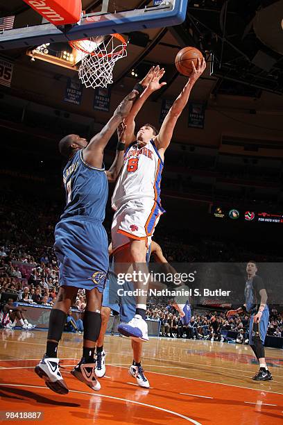 Danilo Gallinari of the New York Knicks shoots against Andray Blatche of the Washington Wizards on April 12, 2010 at Madison Square Garden in New...