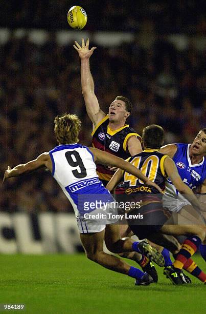 Ken McGregor for Adelaide reaches for the ball watched by Jess Sinclair for the Kangaroos in the round 5 match of the AFL between the Adelaide Crows...