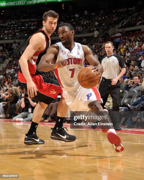 Ben Gordon of the Detroit Pistons drives around Andrea Bargnani of the Toronto Raptors in a game at the Palace of Auburn Hills on April 12, 2010 in...