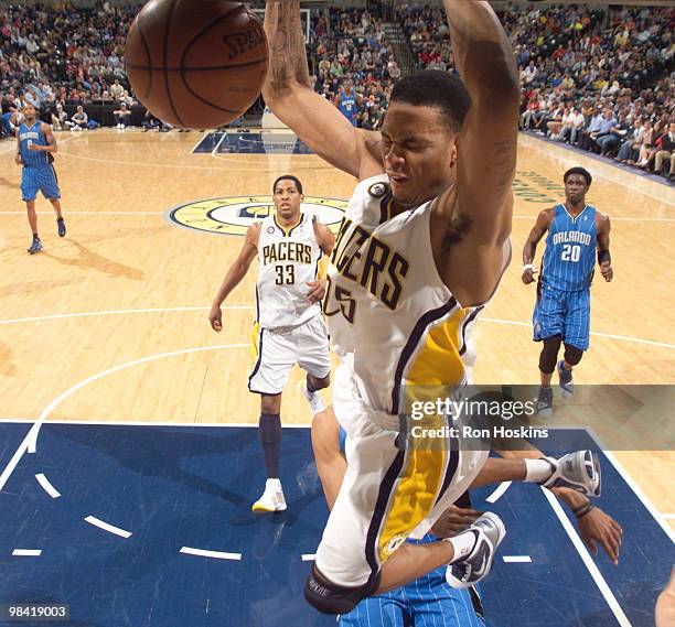 Brandon Rush of the Indiana Pacers jams on the Orlando Magic at Conseco Fieldhouse on April 12, 2010 in Indianapolis, Indiana. NOTE TO USER: User...