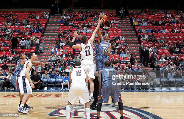 Theo Ratliff of the Charlotte Bobcats wins the opening tip-off against Brook Lopez of the New Jersey Nets on April 12, 2010 during the last Nets game...