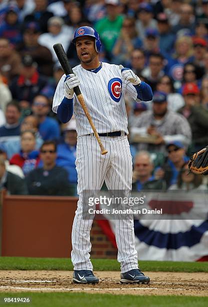Aramis Ramirez of the Chicago Cubs reacts after striking out against the Milwaukee Brewers on Opening Day at Wrigley Field on April 12, 2010 in...