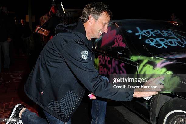 Professional skateboarder Tony Hawk arrives at Banksy's "Exit Through The Gift Shop" premiere at the Los Angeles Theater on April 12, 2010 in Los...