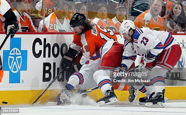 Scott Hartnell of the Philadelphia Flyers skates against Chris Drury of the New York Rangers on April 11, 2010 at Wachovia Center in Philadelphia,...