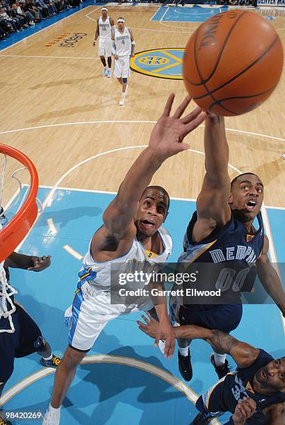 Aaron Afflalo of the Denver Nuggets goes for a rebound against Darrell Arthur of the Memphis Grizzlies on April 12, 2010 at the Pepsi Center in...