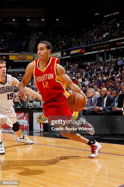 Kevin Martin of the Houston Rockets drives to the basket around Beno Udrih of the Sacramento Kings on April 12, 2010 at ARCO Arena in Sacramento,...