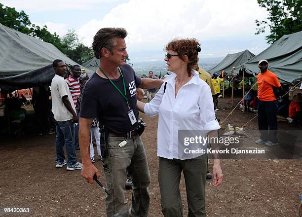 Actors Sean Penn greets Susan Sarandon after a visit to a camp for internally displaced persons managed by Penn and his Jenkins-Penn Humanitarian...