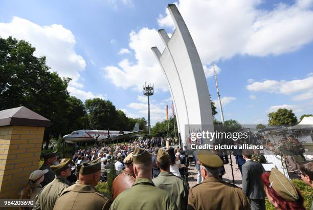 June 2018, Frankfurt am Main, Germany: Guests have gathered for the 70th jubilee of the Berlin air bridge at the memorial site at the Frankfurt...