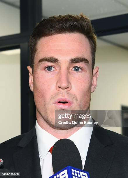 Jeremy Cameron of the Giants walks out of the AFL Tribunal hearing into his striking charge at AFL House on June 26, 2018 in Melbourne, Australia.