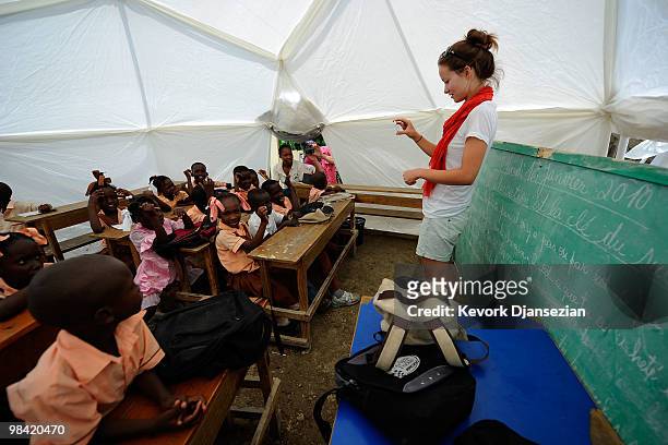 Actress Olivia Wilde visit sa camp for internally displaced persons managed by actor Sean Penn and his Jenkins-Penn Humanitarian Relief Organization...