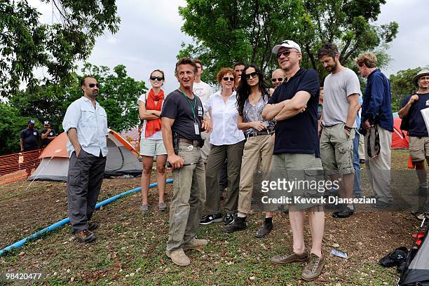 Actor Sean Penn speaks to Susan Sarandon, Demi Moore, Olivia Wilde, Director-Producer Paul Haggis, Gerard Butler,during a visit a camp for internally...