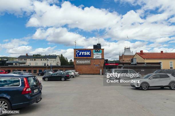 Autombobiles sit parked in a car parking lot in Solleftea, Sweden, on Monday, June 18, 2018. When the maternity hospital was closed in the Solleftea...