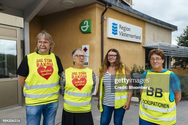 From left, Hkan Lindberg, Marie Malmsten, Vivi Nordin and Mona Olsson, stand outside the hospital in Solleftea, Sweden, on Monday, June 18, 2018....