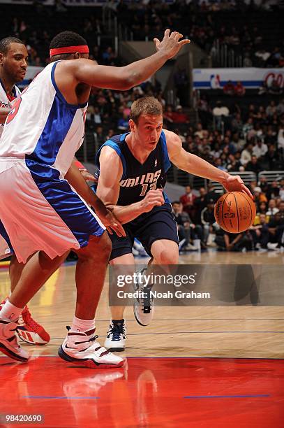 Matt Carroll of the Dallas Mavericks dribbles against Craig Smith of the Los Angeles Clippers at Staples Center on April 12, 2010 in Los Angeles,...