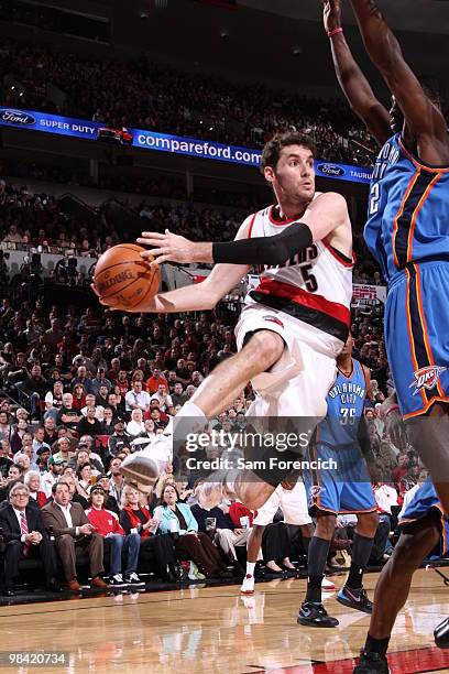 Rudy Fernandez of the Portland Trail Blazers looks for an opening around Jeff Green of the Oklahoma City Thunder during a game on April 12, 2010 at...