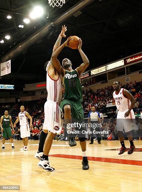 Rod Benson of the Reno Bighorns shoots while being defended by Julian Sensley of the Rio Grande Valley Vipers on April 12, 2010 at the State Farm...