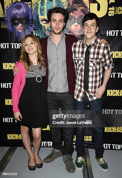 Chloe Moretz, Aaron Johnson and Christopher Mintz-Plasse attend the "Kick-Ass" cast meet and greet fan event at Hot Topic on April 12, 2010 in...