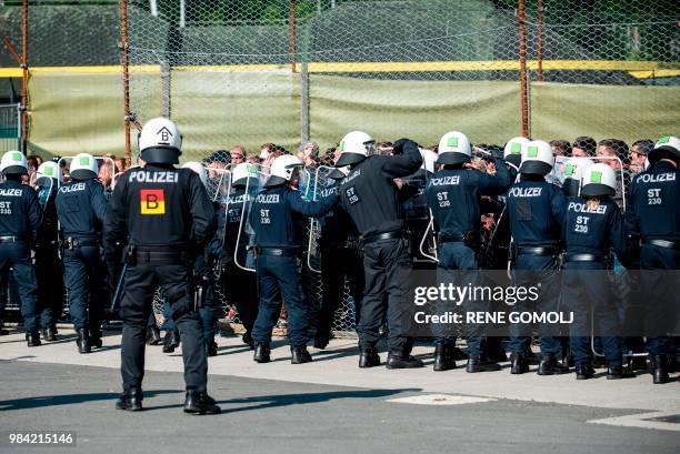 New border patrol police unit called Puma as well as performers of "strangers" take part in the exercise "ProBorders" at the Spielfeld border...