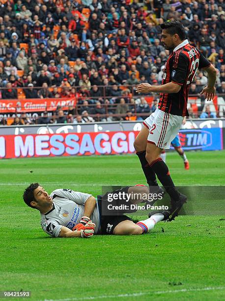 Mariano Andujar goal kepeer of Catania saves at the feet of Marco Borriello of Milan during the Serie A match between AC Milan and Catania Calcio at...