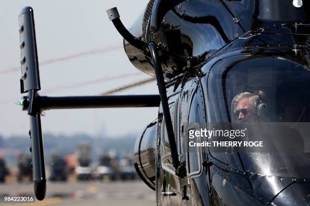 King Philippe - Filip of Belgium is pictured as he pilotes a helicopter during the celebration of the 25th anniversary of the Air Support department...