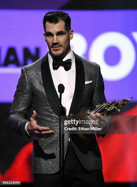 Brian Boyle of the New Jersey Devils accepts the Bill Masterton Memorial Trophy, given for perseverance and dedication to hockey, during the 2018 NHL...