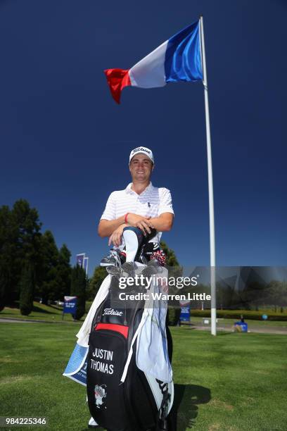 Justin Thomas of the USA poses for a picture with the French flag ahead of the HNA Open de France at Le Golf National on June 26, 2018 in Paris,...