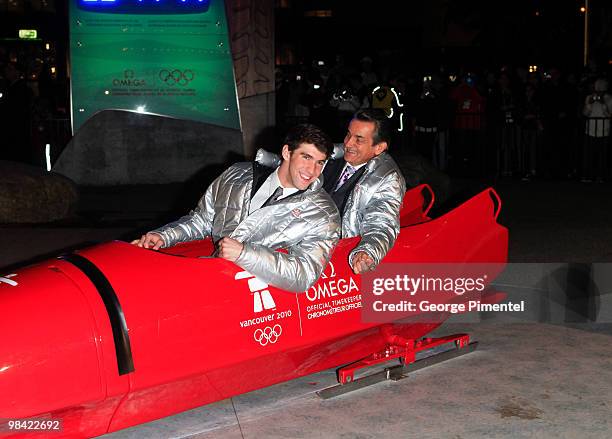 Olympic Gold Medalist Michael Phelps and President of OMEGA Stephen Urquhart attend the OMEGA Cocktail Celebration at the Fairmont Hotel on February...