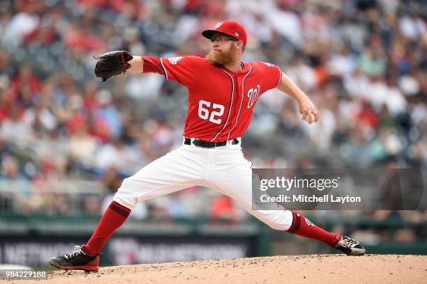 Sean Doolittle of the Washington Nationals pitches during game one of a doubleheader against the New York Yankees at Nationals Park on June 18, 2018...