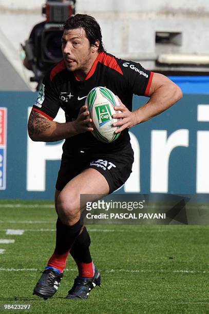 Toulouse's scrum-half Byron Kelleher runs with the ball during the European Rugby cup match Toulouse vs Stade Francais on April 11, 2010 in Toulouse....
