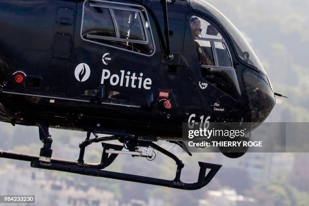 King Philippe - Filip of Belgium pilots a helicopter during the celebration of the 25th anniversary of the Air Support department of the federal...