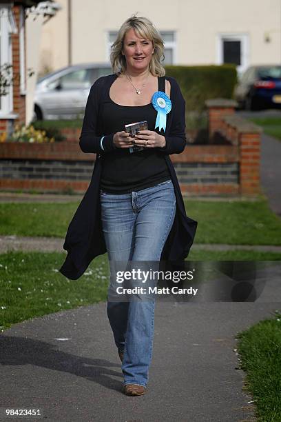 Conservative candidate Caroline Dinenage delivers pamplets as she campaigns in the constituency of Gosport in Hampshire on April 10, 2010 in Gosport,...