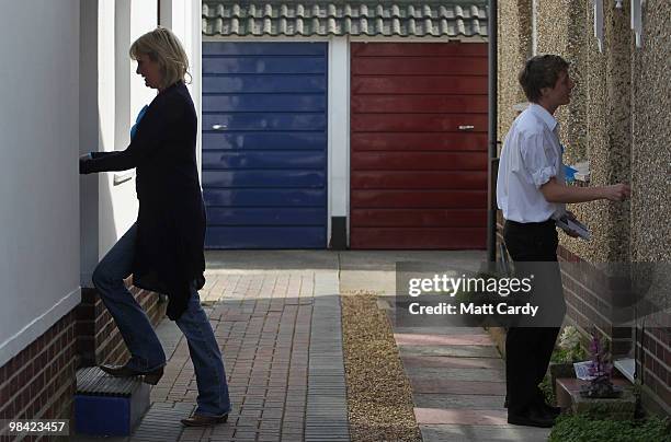 Conservative candidate Caroline Dinenage delivers pamplets as she campaigns in the constituency of Gosport in Hampshire on April 10, 2010 in Gosport,...