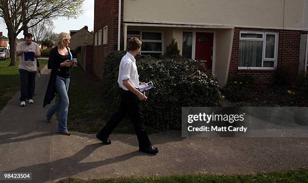 Conservative candidate Caroline Dinenage delivers pamplets as she campaigns in the constituency of Gosport in Hampshire on April 10, 2010 in Gosport,...