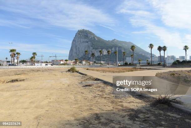 View of Gibraltar from La Linea. Gibraltar is a tiny British Colony located in Southern Spain. It has a population of 32,000 in 2018.