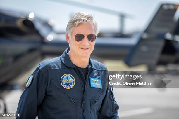 King Philip of Belgium flies an MD902 Explorer helicopter during a visit to the 25th Anniversary of the Federal Police Air Support Directorate in the...