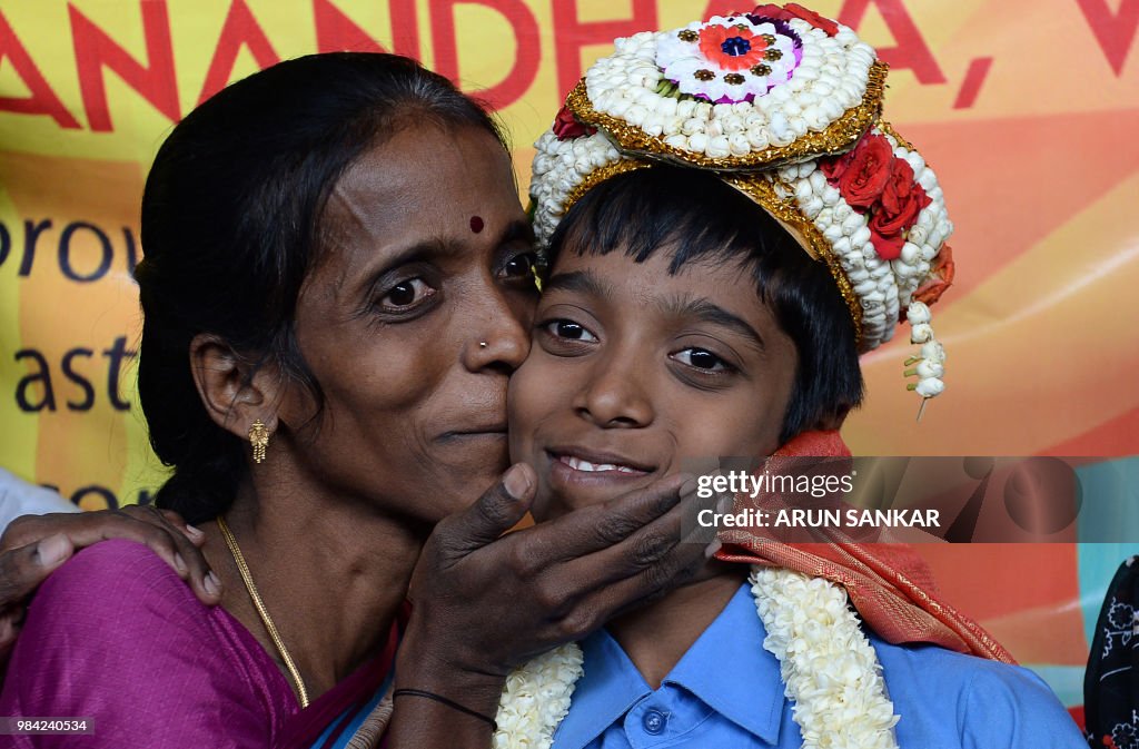 Indian chess prodigy Rameshbabu Praggnanandhaa smiles as his