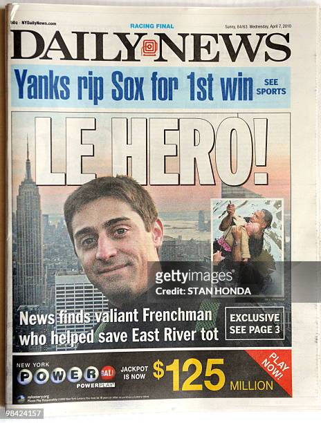 The front page of the New York Daily News April 7, 2010 featuring Julien Duret of Lyon, France, who helped save a baby that fell into New York's East...