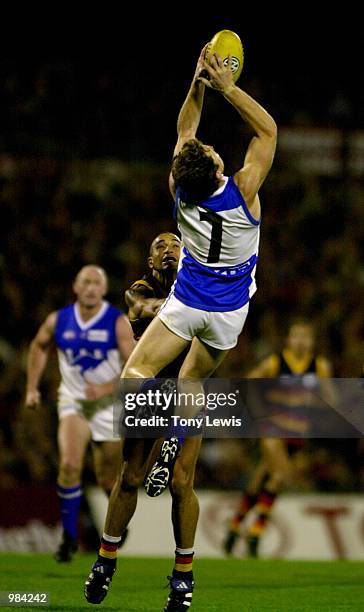 Adam Simpson for the Kangaroos marks in the round 5 match of the AFL between the Adelaide Crows and the Kangaroos played at Football Park in...