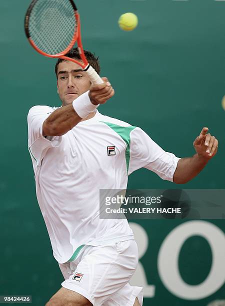 Croatian player Marin Cilic hits a return to his Russian opponent Igor Andreev during their Monte-Carlo ATP Masters Series Tournament tennis match,...