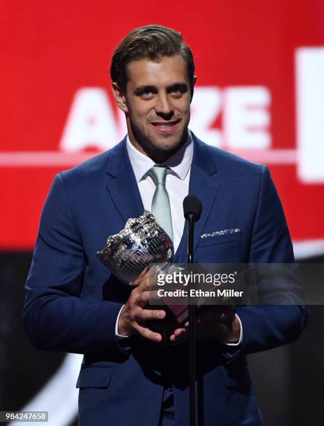 Anze Kopitar of the Los Angeles Kings accepts the Frank J. Selke trophy, given to the top defensive forward, during the 2018 NHL Awards presented by...