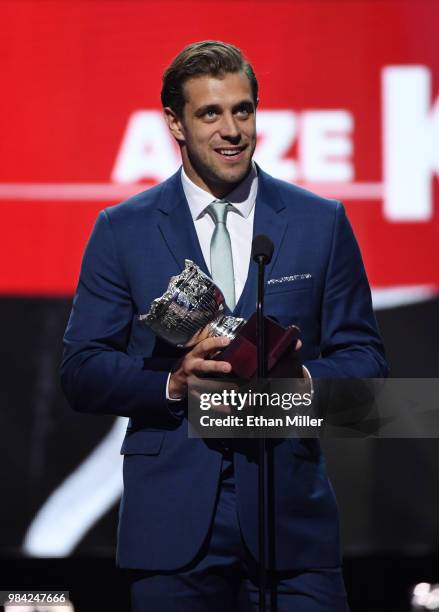 Anze Kopitar of the Los Angeles Kings accepts the Frank J. Selke trophy, given to the top defensive forward, during the 2018 NHL Awards presented by...