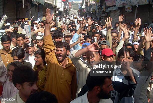 Pakistani demonstrators shout slogans in Mansehra on April 13 against deaths during a protest against the renaming of Pakistan's North West Frontier...