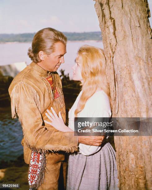 American actor James Stewart as Linus Rawlings and American actress Carroll Baker as Eve Prescott in the film 'How the West Was Won', 1962.