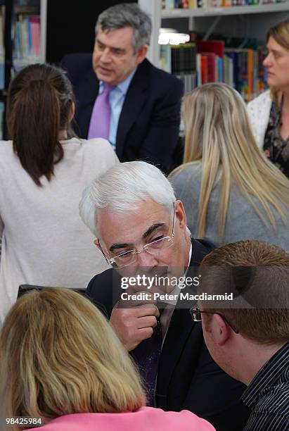 Chancellor Alistair Darling and Prime Minister Gordon Brown talk to students at Derby College on April 13, 2010 in Derby, England. The General...