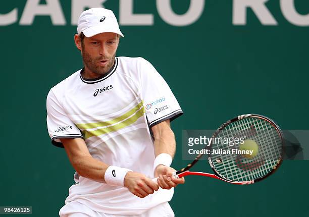 Stephane Robert of France plays a backhand in his match against Florent Serra of France during day two of the ATP Masters Series at the Monte Carlo...