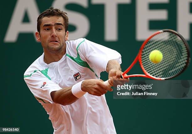 Marin Cilic of Croatia plays a backhand in his match against Igor Andreev of Russia during day two of the ATP Masters Series at the Monte Carlo...