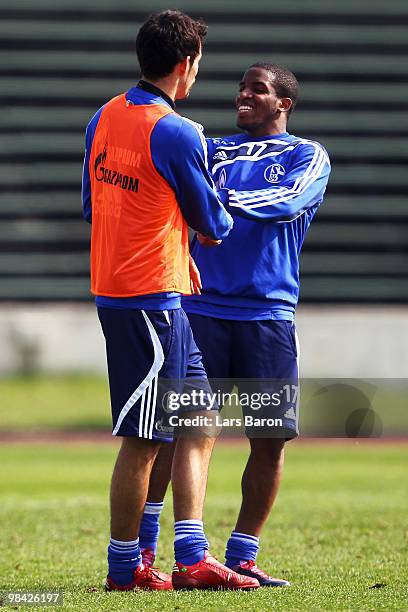 Kevin Kuranyi jokes with Jefferson Farfan during a FC Schalke 04 training session on April 13, 2010 in Gelsenkirchen, Germany.