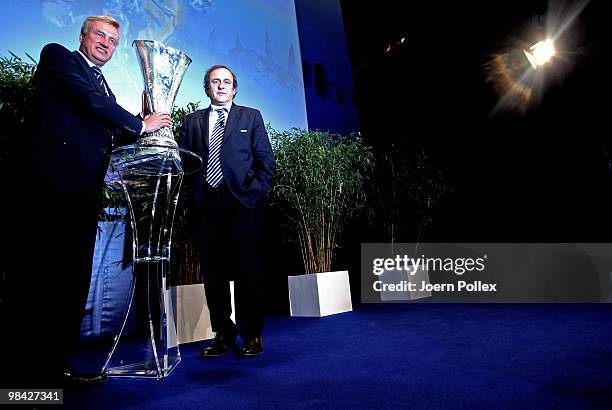 Mayor of Hamburg Ole Von Beust and UEFA president Michel Platini pictured with the UEFA Europa League cup during to the handover of the UEFA Europa...